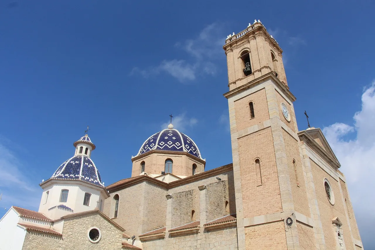 The blue-and-white domes and bell tower of Altea's church