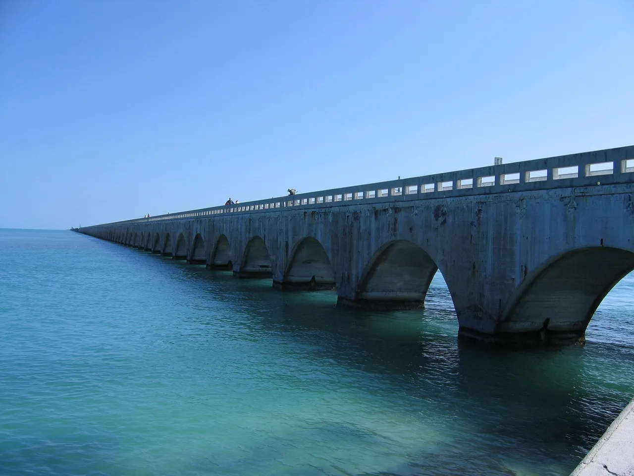 The old Seven Mile Bridge in the Florida Keys stretching away across shallow turquoise water