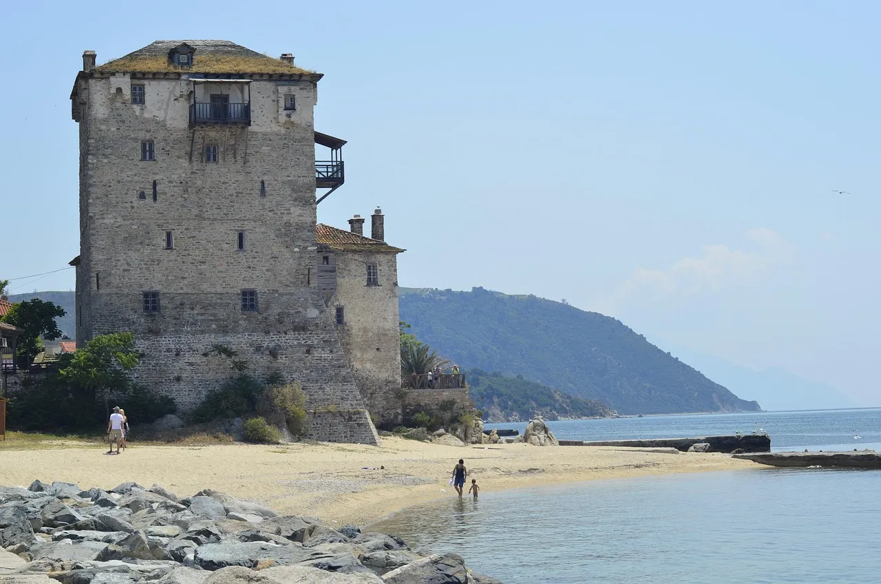 The old Byzantine tower by the beach at Ouranoupoli in Halkidiki