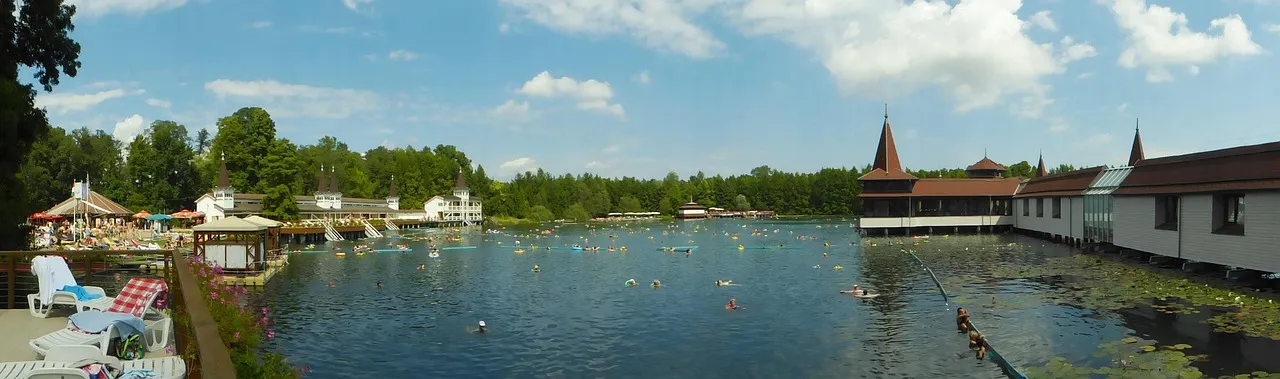 Lake HĂ©vĂz in Hungary, with its thermal waters, a wooden pier and the spa pavilion standing out over the lake