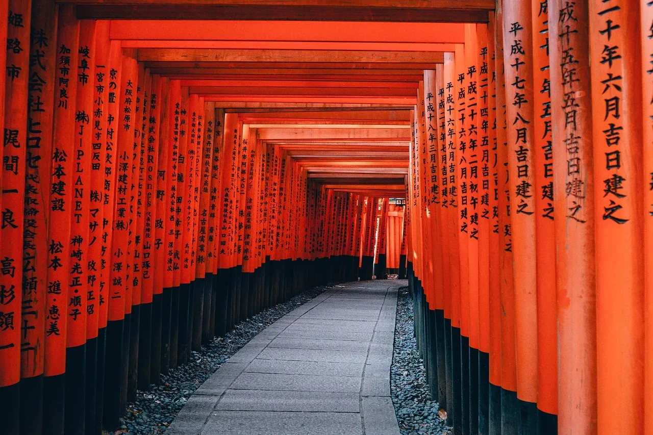 A path through red torii gates at Fushimi Inari shrine in Kyoto