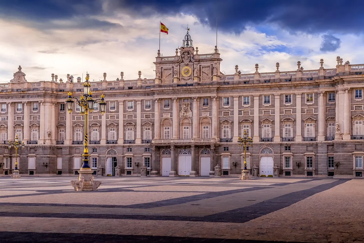The Royal Palace of Madrid with its pale stone façade and wide square in front
