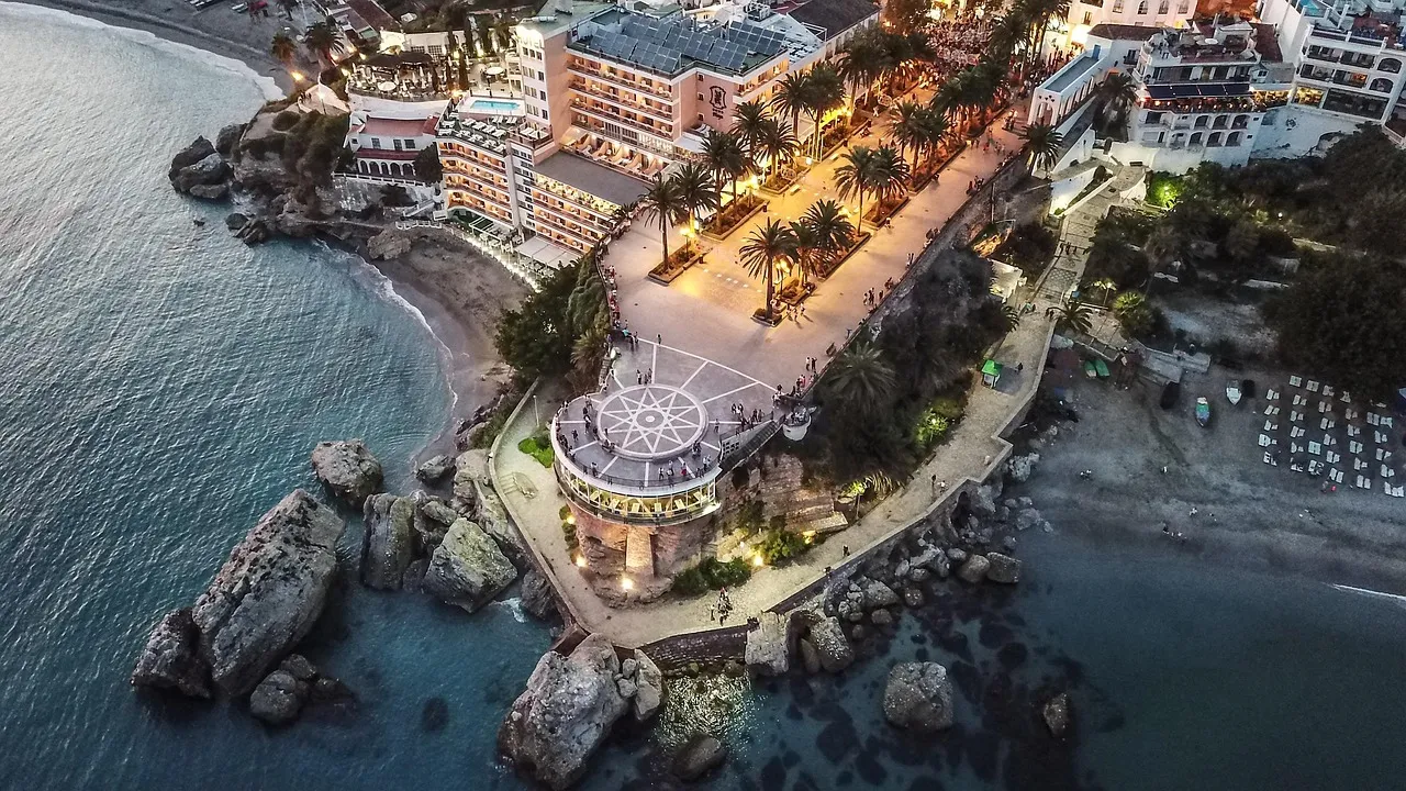 The Balcón de Europa in Nerja, a clifftop promenade above small coves