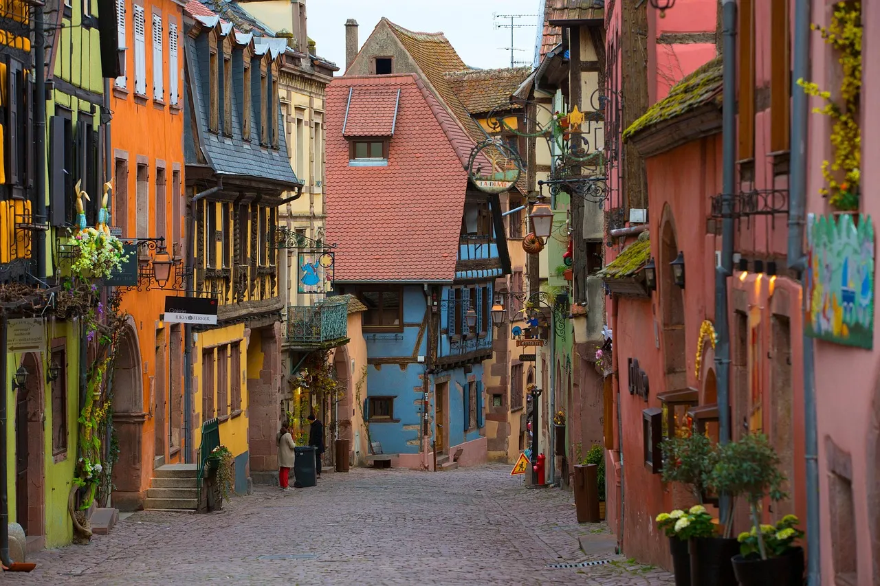 Colourful half-timbered houses along Riquewihr's main street