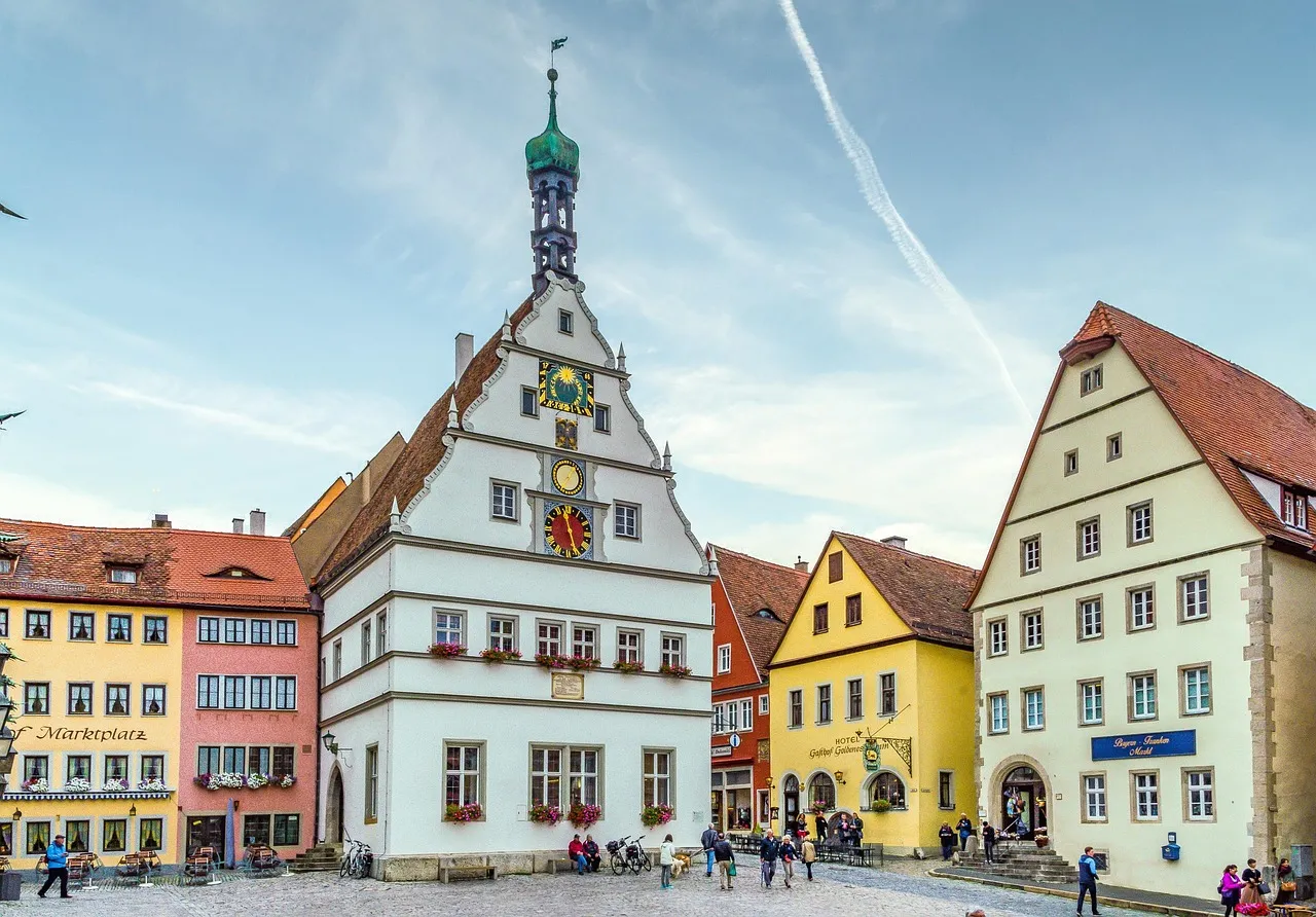 Painted half-timbered buildings on the market square in Rothenburg ob der Tauber