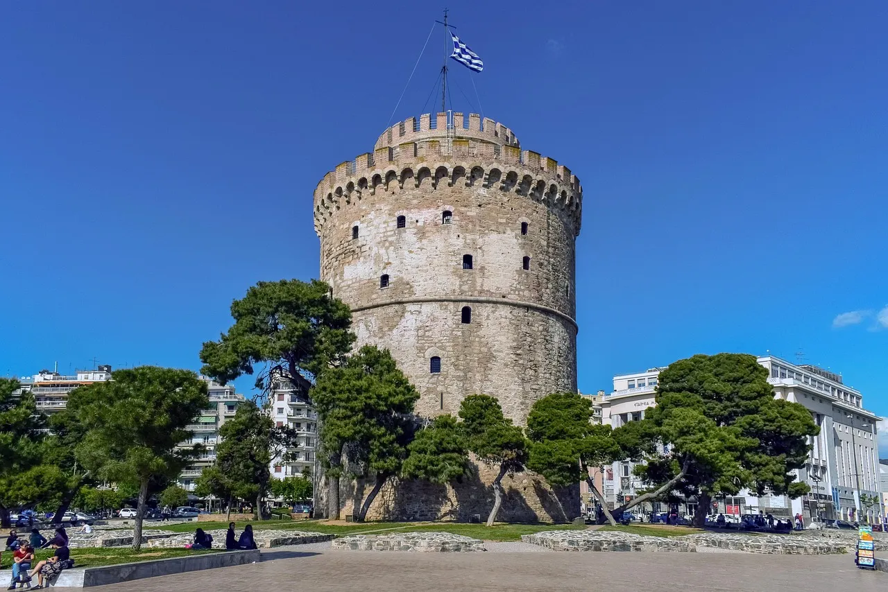 The White Tower on Thessaloniki's seafront under a blue sky